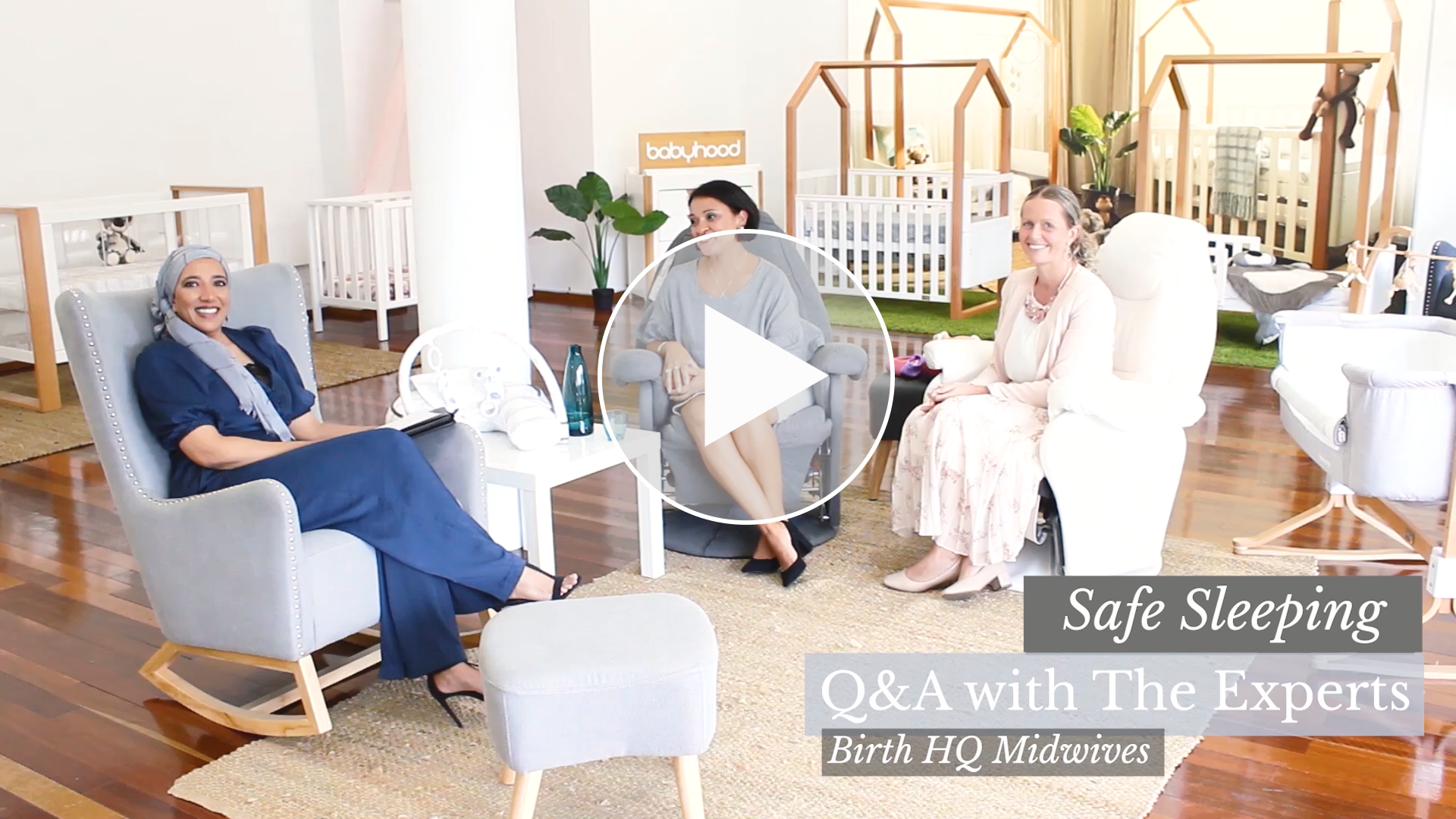 Three women discuss safe baby sleep in stylish nursery with cribs at Babyhood GCC store.