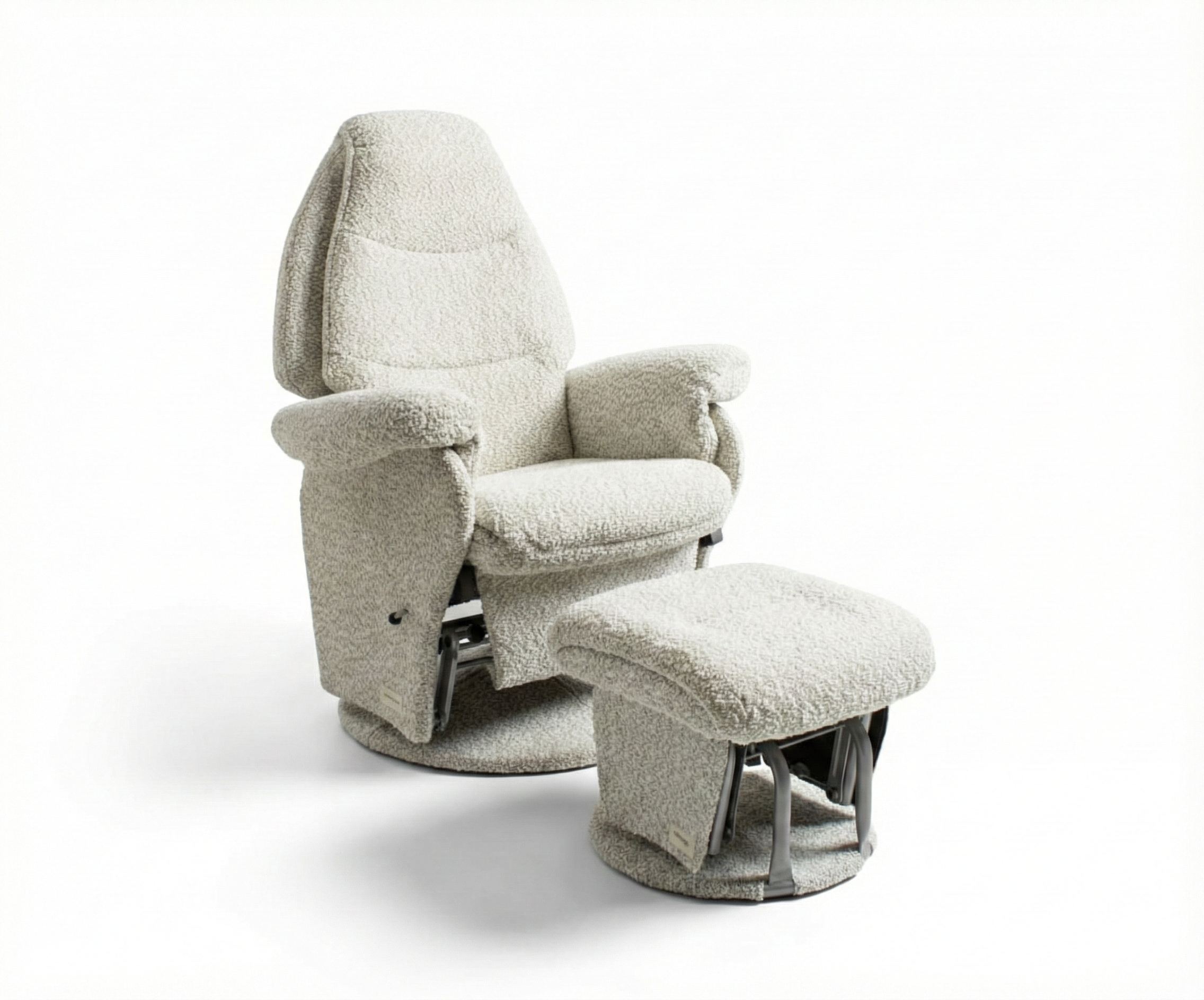 Mother sitting on grey nursing chair with baby, Babyhood GCC nursery setting