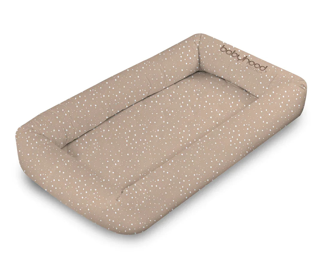 Babyhood Cosy Crib in nude drops pattern, soft beige baby lounger with white polka dots.