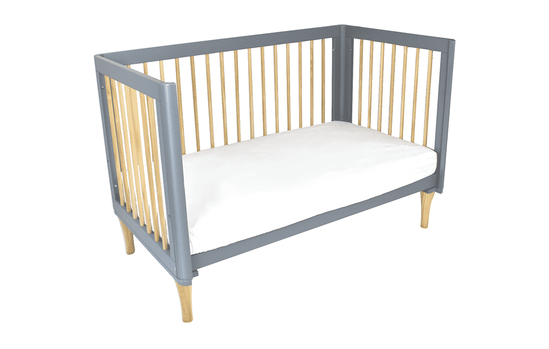 Grey and natural wood toddler bed with open sides, minimalist design from Babyhood GCC