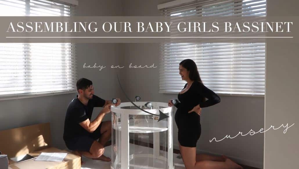 Couple assembling baby bassinet in nursery, Babyhood GCC, expecting parents