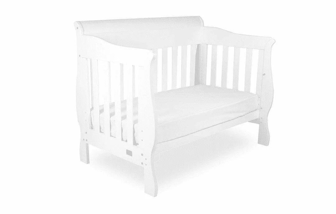 Amani Sleigh Cot — A design with more chapters.